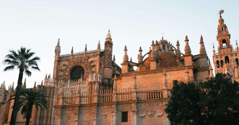 Seville Cathedral and La Giralda glowing in the evening light during Corpus Christi in Seville